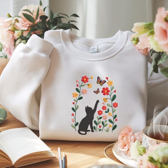 Picture of Embroidered Black Cat Chasing Butterfly Meadow Sweatshirt , Flower With Cat Hoodie, Black Cat And Wildflowers Sweatshirt, Cat Lover Shirt