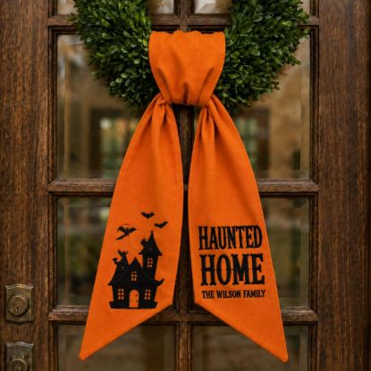 Picture of Personalized Haunted Home Wreath Sash Bow, Custom Family Name Halloween Wreath Bow, Embroidered Haunted House Door Hanger, Spooky Door Decor