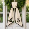 Picture of Personalized Halloween Wreath Sash Bow, Custom Monogram Witch Hat Wreath Bow, Embroidered Front Door Wreath Sash, Spooky Fall Porch Decor