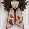 Picture of Personalized Christmas Stocking Wreath Bow, Embroidered Holiday Door Bow, Custom Christmas Wreath Sash, Farmhouse Front Door Decor, Xmas Bow