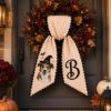 Picture of Personalized Pet Portrait Halloween Wreath Sash, Custom Dog Embroidered Door Bow, Monogram Front Door Decor, Dog Lover Halloween Gift