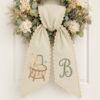 Picture of Personalized Baby Wreath Sash, Custom Embroidered Bassinet Monogram Sash, New Baby Door Decor, Nursery Wreath Bow, Baby Shower Gift