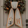 Picture of Personalized Halloween Sash, Embroidered Candle Moon Monogram Sash, Grey Stripe Spooky Accessory, Custom Initial Halloween Decor Gift