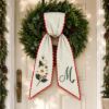 Picture of Personalized Christmas Sash, Magnolia Flower Monogram Sash, Embroidered Holiday Floral Accessory, Custom Initial Christmas Gift for Her