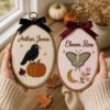 Picture of Personalized Fall Name Embroidery Hoop, Crow Pumpkin & Luna Moth Nursery Decor, Autumn Baby Gift, Custom Kids Room Wall Art, Halloween Gift