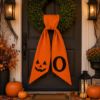 Picture of Personalized Halloween Wreath Sash, Pumpkin Face Monogram Door Bow, Orange Halloween Wreath Decor, Spooky Front Door Decoration Halloween